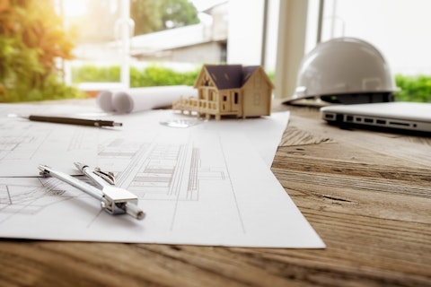 Image of engineering objects on workplace top view construction concept engineering tools vintage tone retro filter effect soft focus selective focus